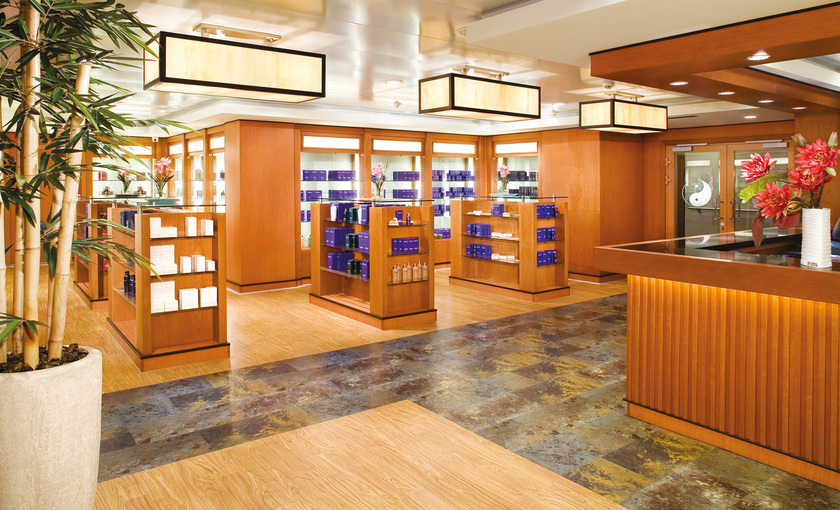 De receptie en winkel van spa op de Norwegian Jade van NCL